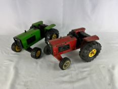 Two Tonka tractors