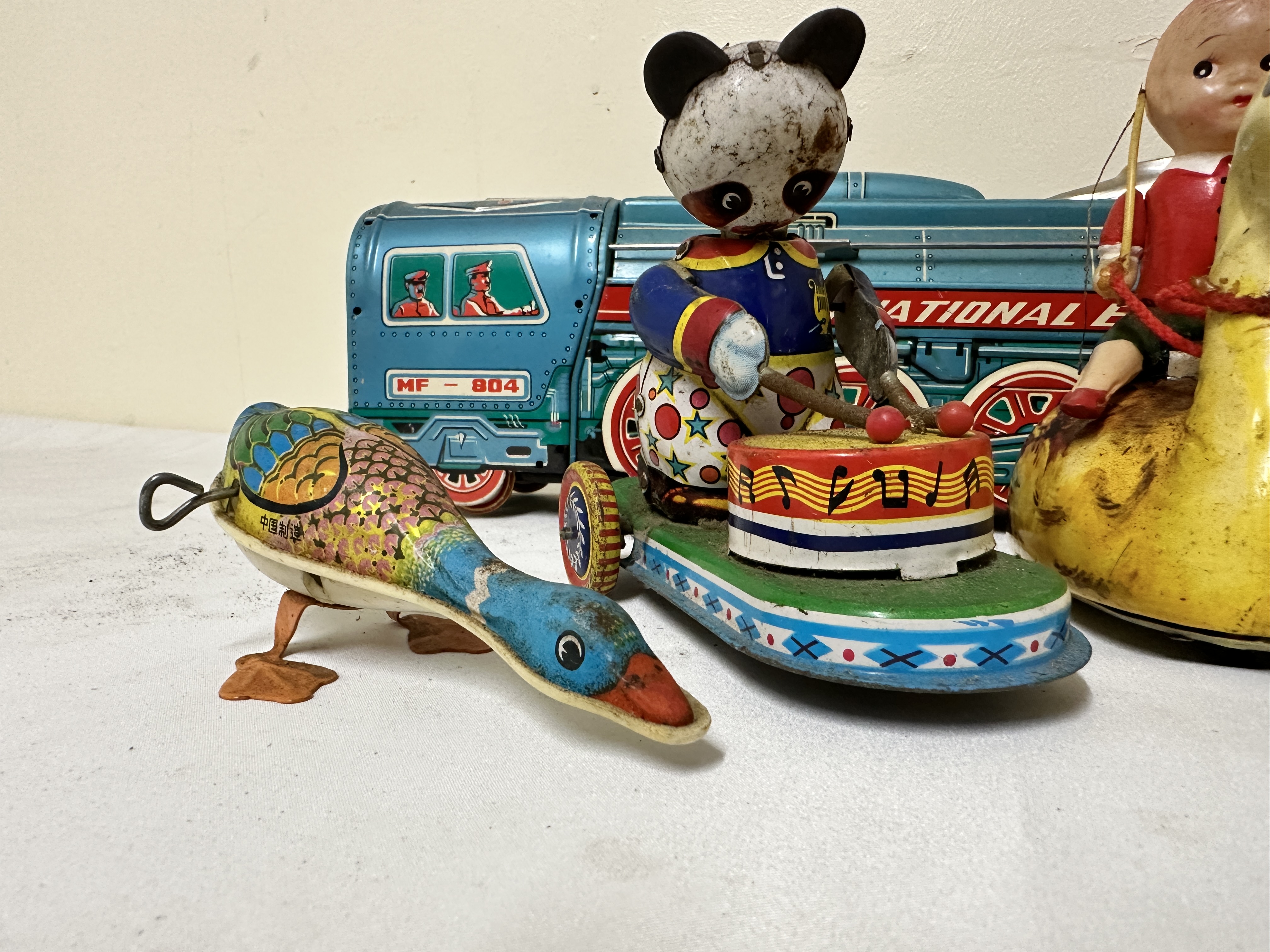 Four tin push along toys - Image 2 of 5