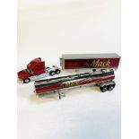 Franklin Mint 1:32 scale 1993 Mack truck; together with a Mack tanker and refrigerated trailer.