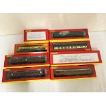 Hornby 00 gauge locomotive together with a quantity of carriages