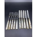 Five knives with silver blades and mother of pearl handles