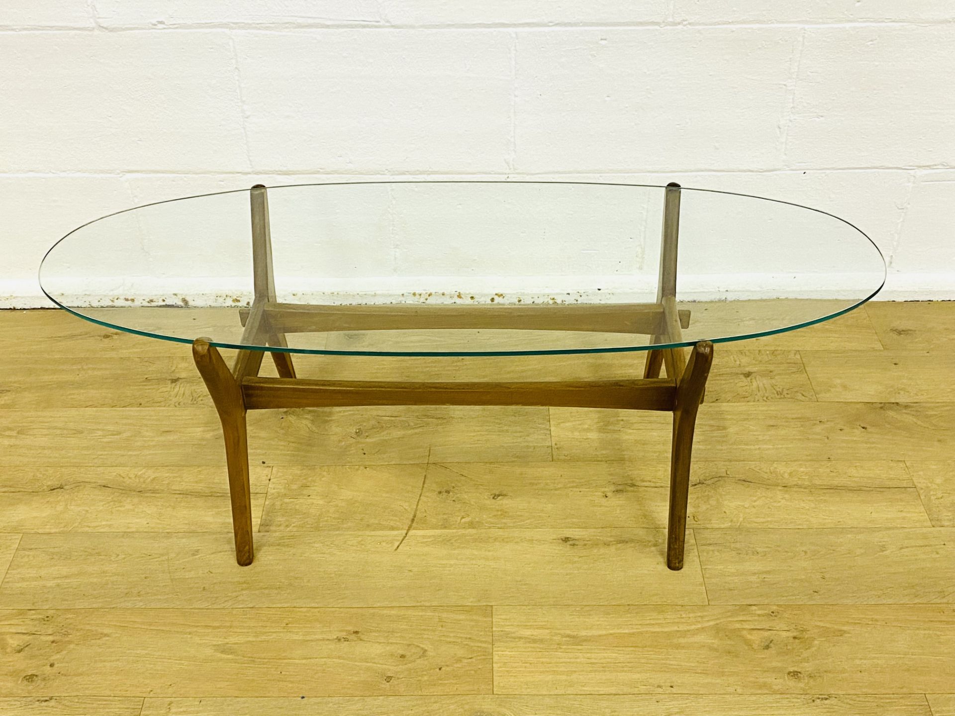 Oval teak glass top coffee table