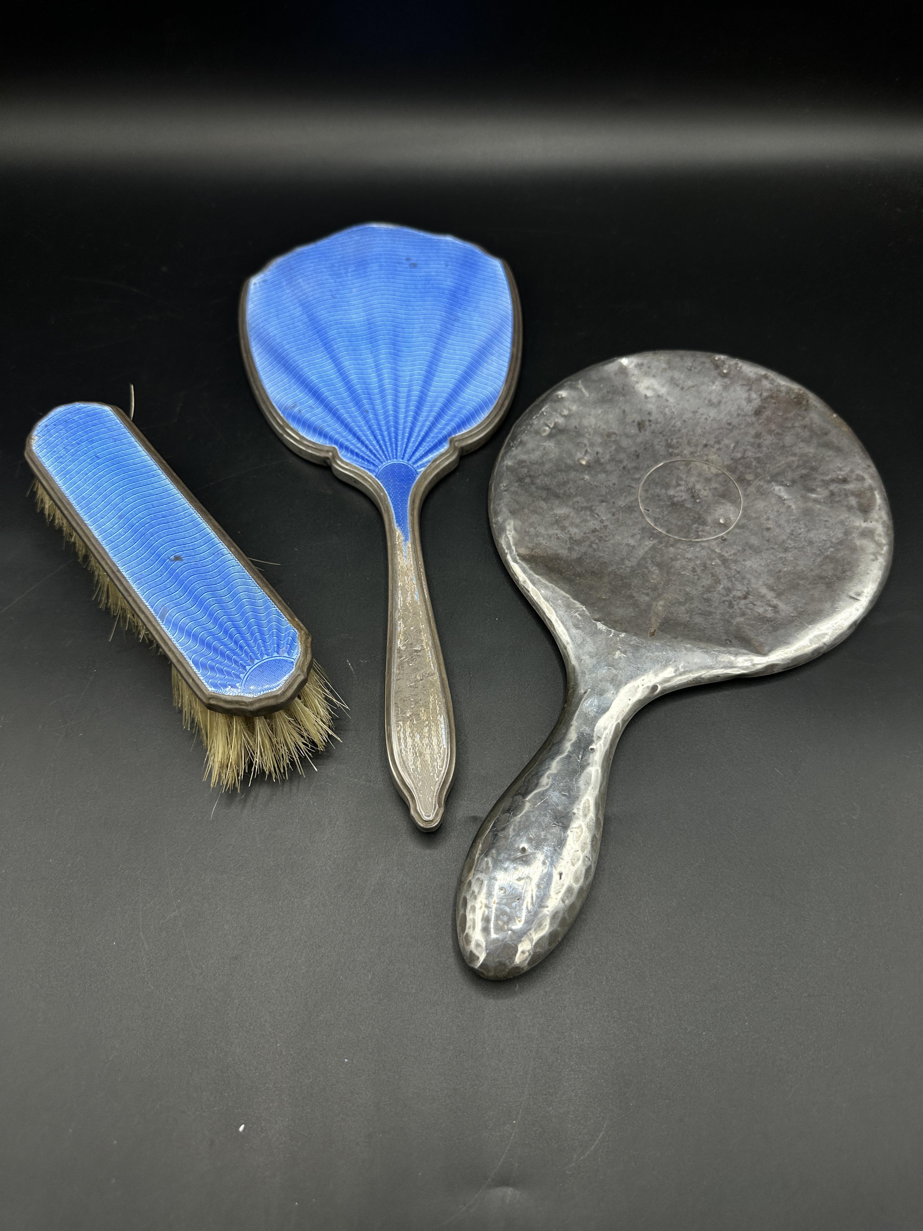 Two silver mirrors and silver backed brush