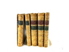 Five leather bound books