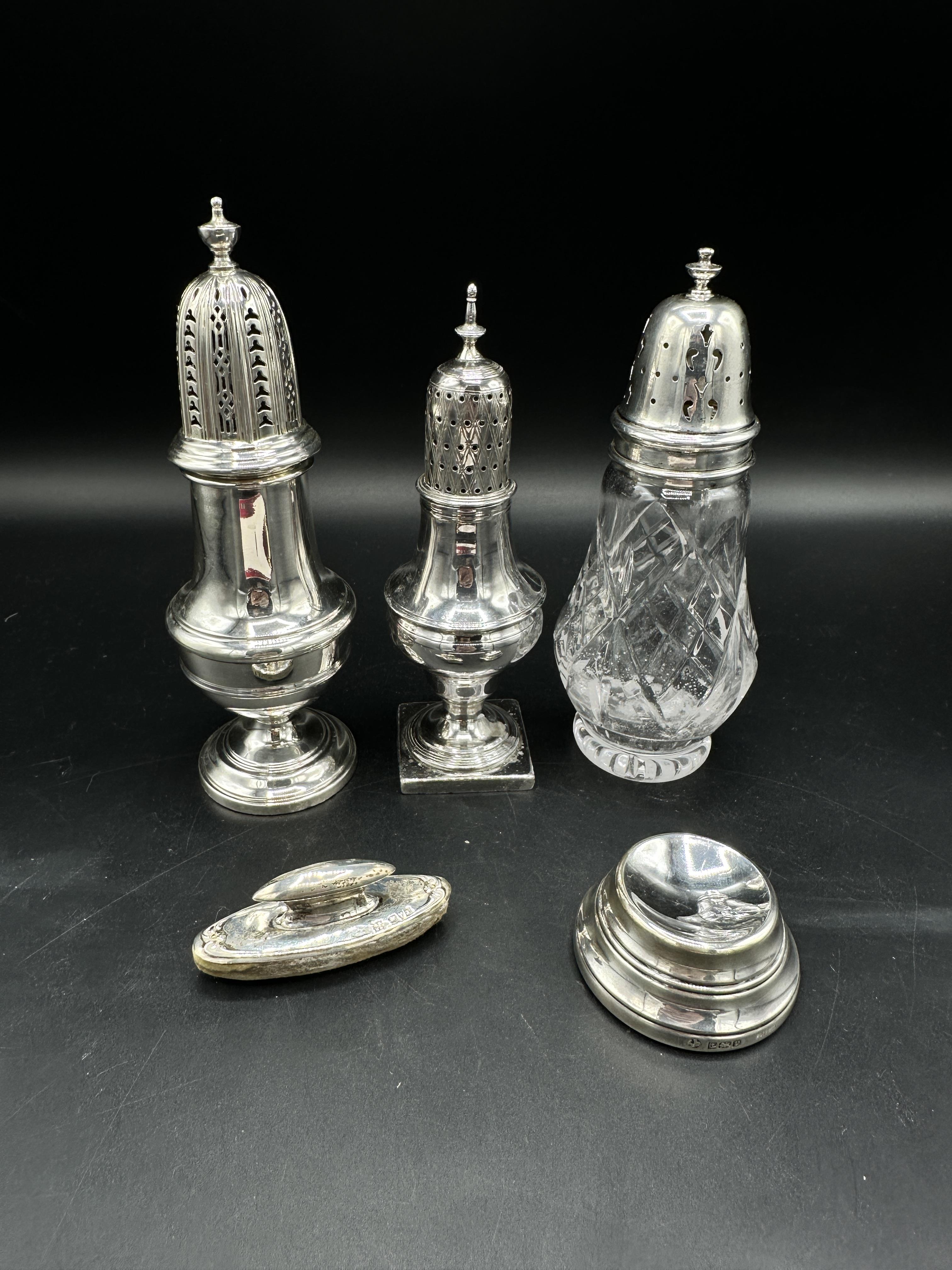 Two silver sugar casters together with a glass and silver sugar caster - Image 4 of 10
