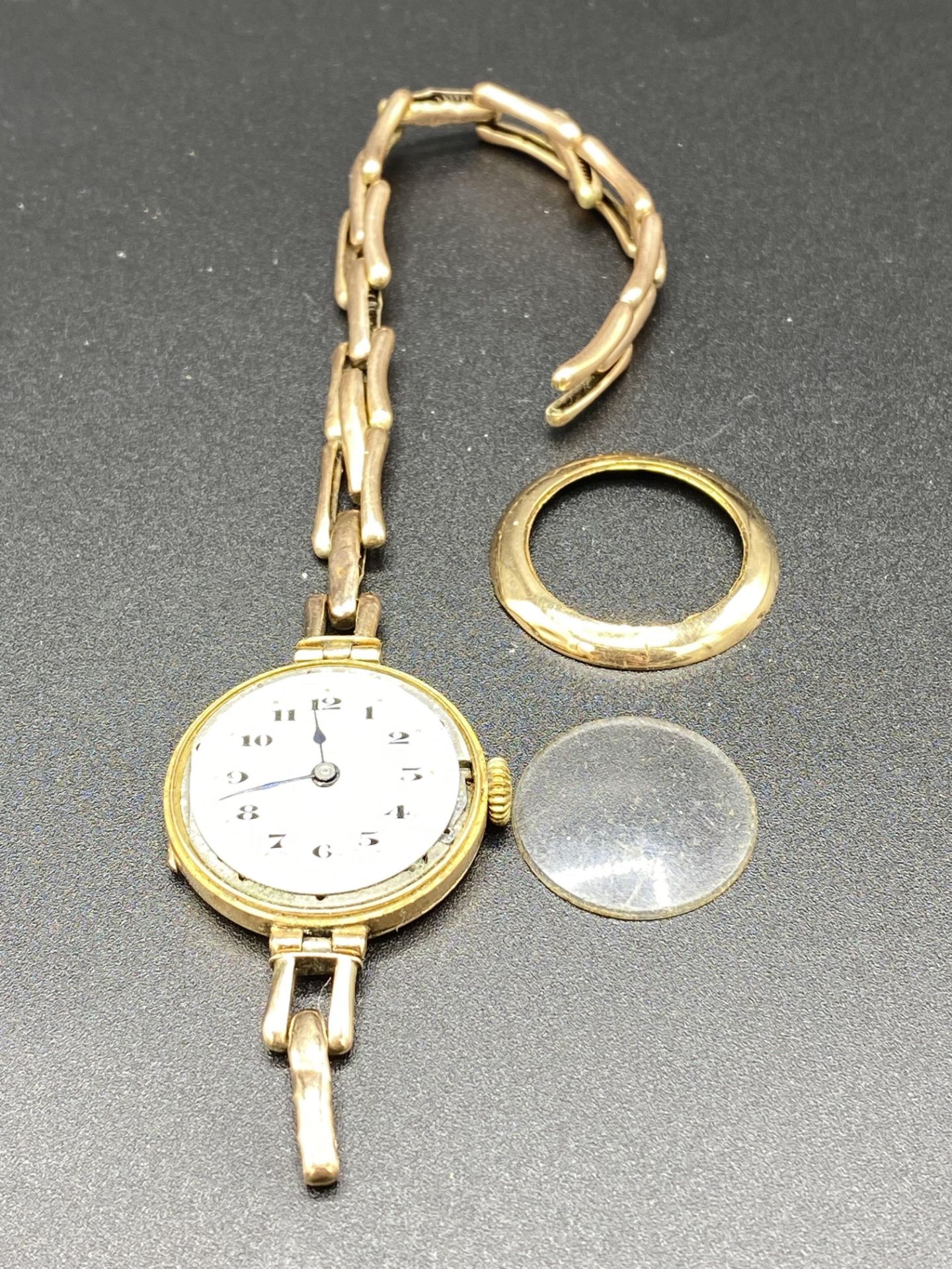 Gold cased Swiss manual wind wrist watch on broken 9ct gold link strap