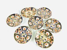 Six Royal Crown Derby plates together with a Royal Crown Derby trinket dish