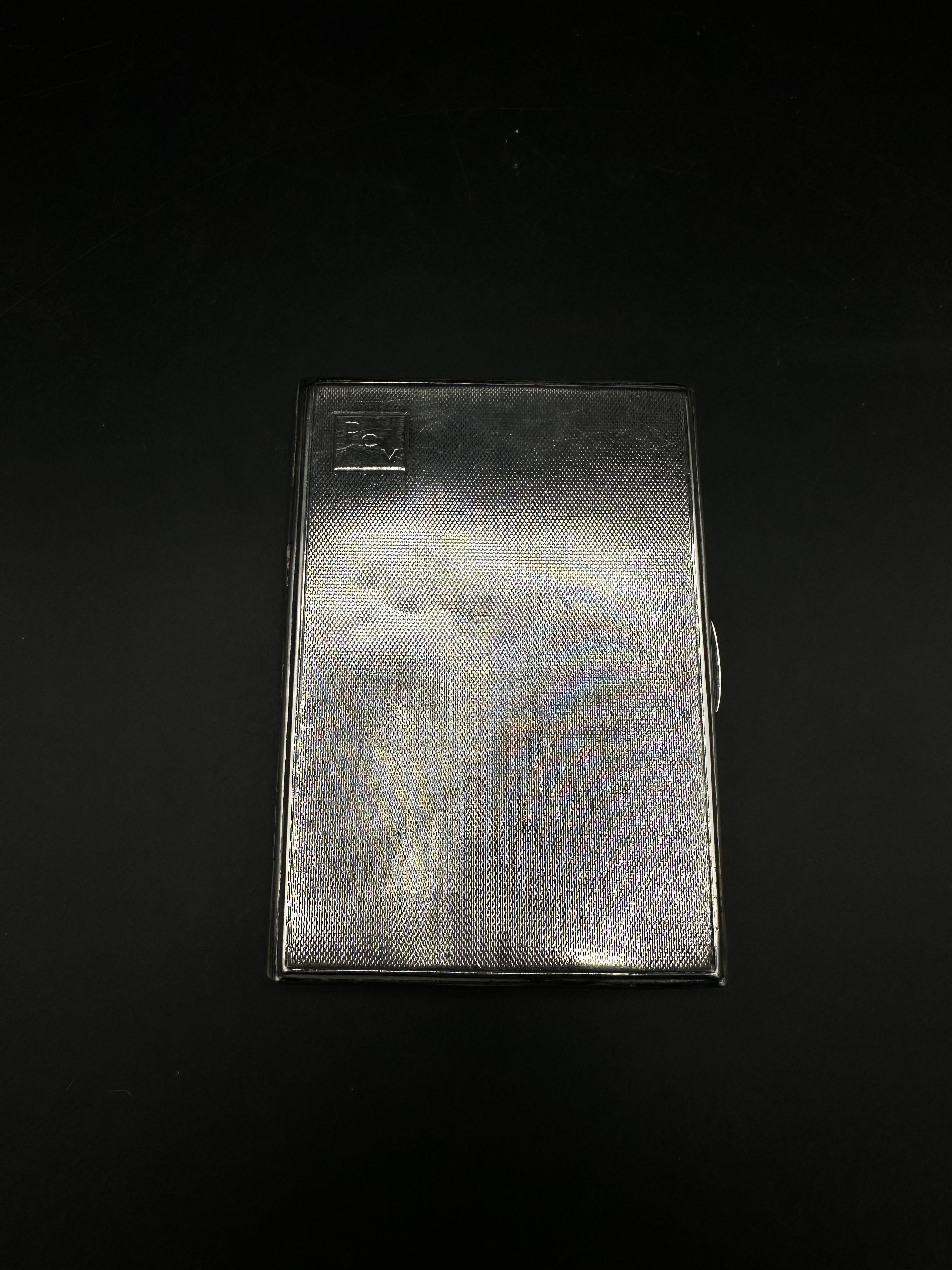 Silver engine turned cigarette case