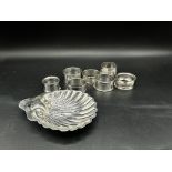 Silver shell dish together with six silver napkin rings