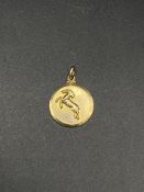 9ct gold pendant with capricorn motif