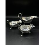 Three silver sauce boats