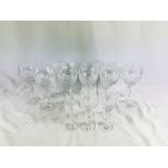 Eleven crystal wine glasses together with six liqueur glasses