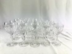 Twelve white wine glasses, together with eight crystal dessert wine glasses.