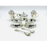 A silver trencher style cruet set by Charles & Richard Comyns, London 1921