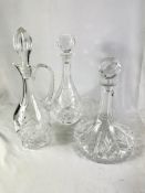 Two crystal decanters together with a ships decanter