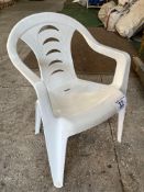 50 white resin garden armchairs. This lot is subject to VAT