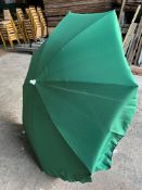 5 no 1.5m diameter green garden umbrellas. This lot is subject to VAT