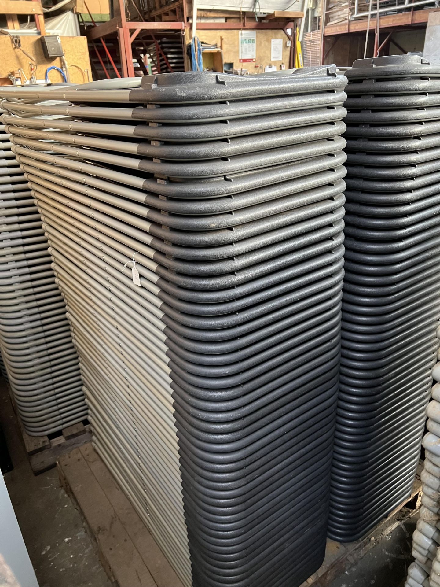 100 Samsonite folding chairs, charcoal. This lot is subject to VAT. - Image 2 of 2