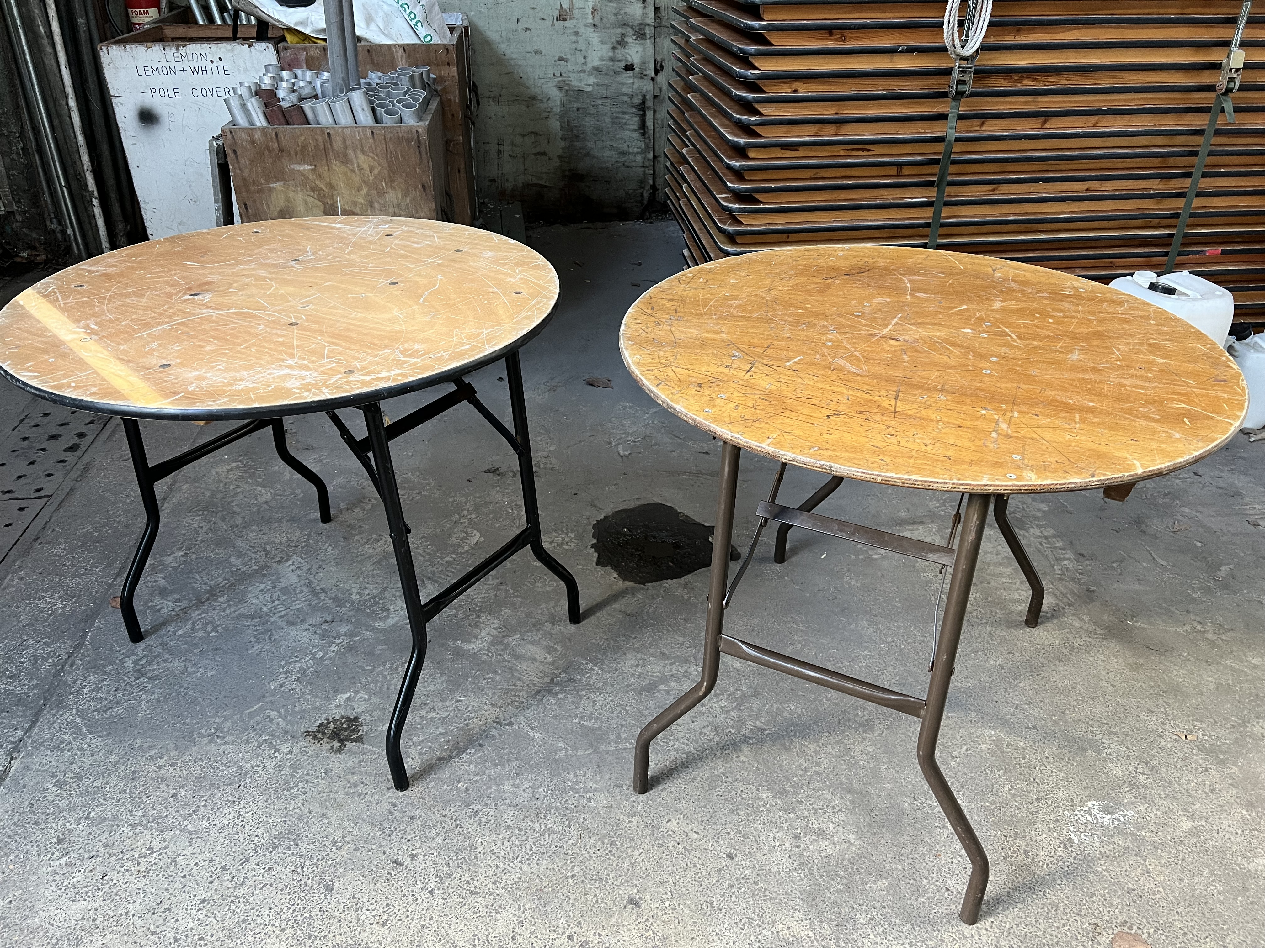 30 no 3ft diameter round tables with folding legs and plywood top. This lot is subject to VAT.