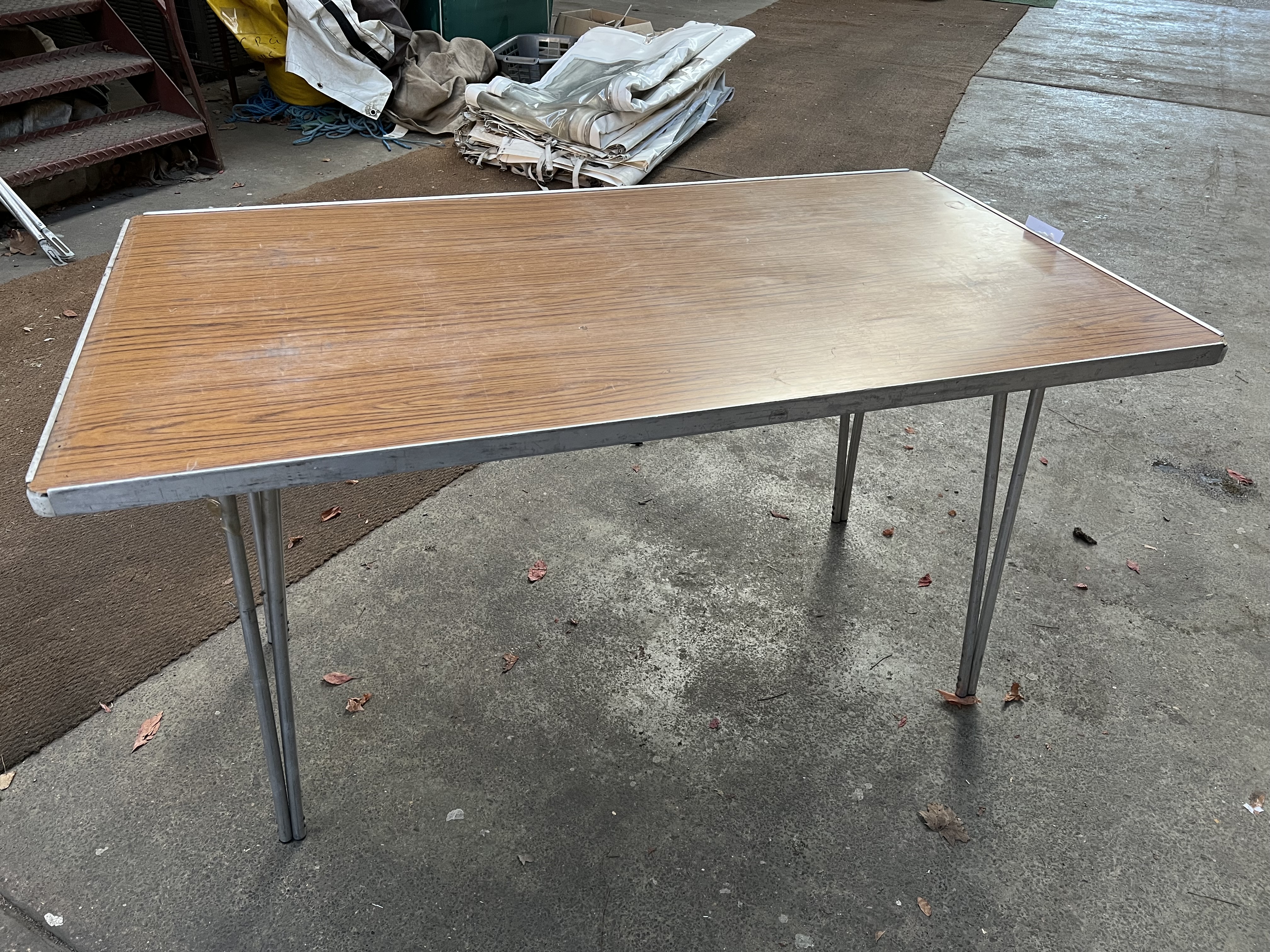 10 Gopak 4ft 6in trestle tables with folding legs and melamine top. This lot is subject to VAT.