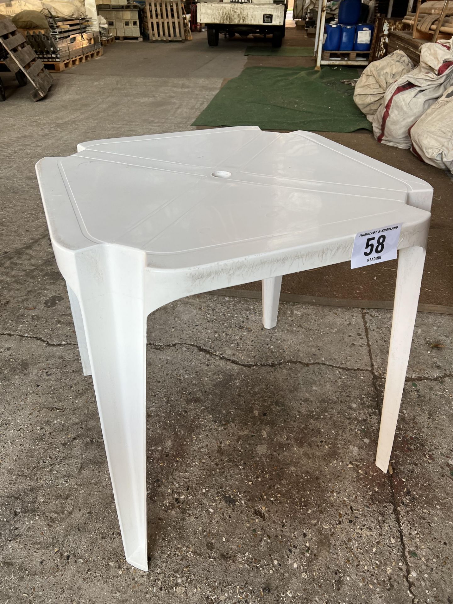 50 square white resin tables 70 x 70 x 71cms (h). This lot is subject to VAT