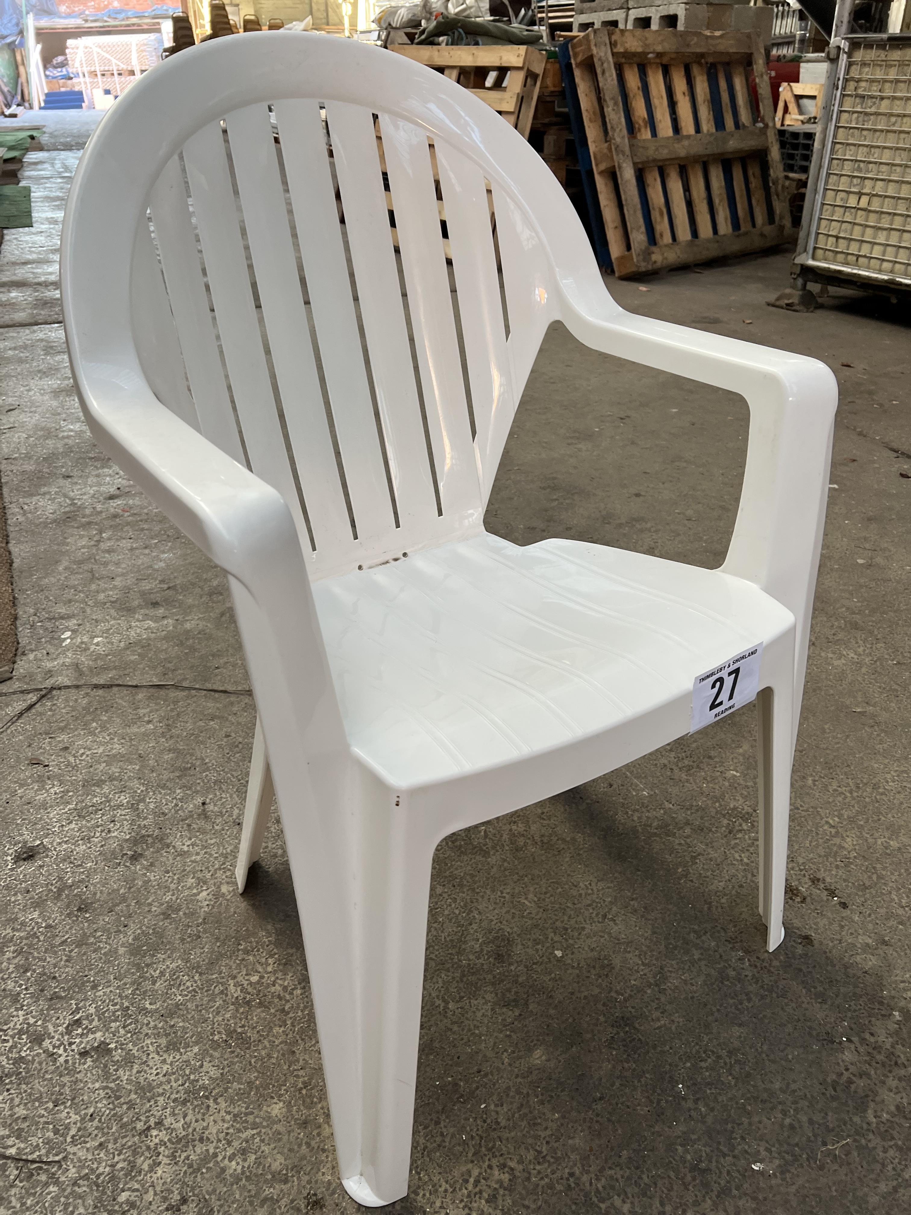 50 white resin garden armchairs. This lot is subject to VAT