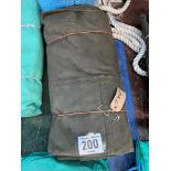 12ft x 12ft Khaki cotton tarpaulin, hemmed, eyeletted and with ropes. This lot is subject to VAT