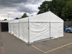 12m x 6m frame tent with white covers, roof and walls. This lot is subject to VAT