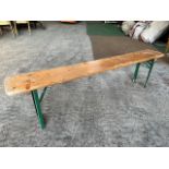 10 no 6ft long wooden benches with metal folding legs. This lot is subject to VAT