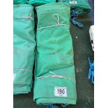 12ft x 12ft green cotton tarpaulin, hemmed, eyeletted and with ropes. This lot is subject to VAT