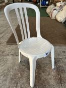 50 white resin bistro chairs. This lot is subject to VAT