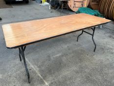 22 no 6ft trestle tables with metal folding legs and plywood top. This lot is subject to VAT.