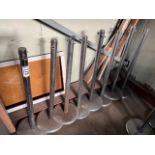 8 chrome stanchions, height 102cms. This lot is subject to VAT