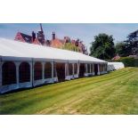 36m x 12m frame tent with roof and walls plus flooring and lining. This lot is subject to VAT