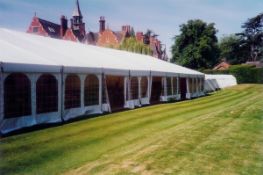 36m x 12m frame tent with roof and walls plus flooring and lining. This lot is subject to VAT