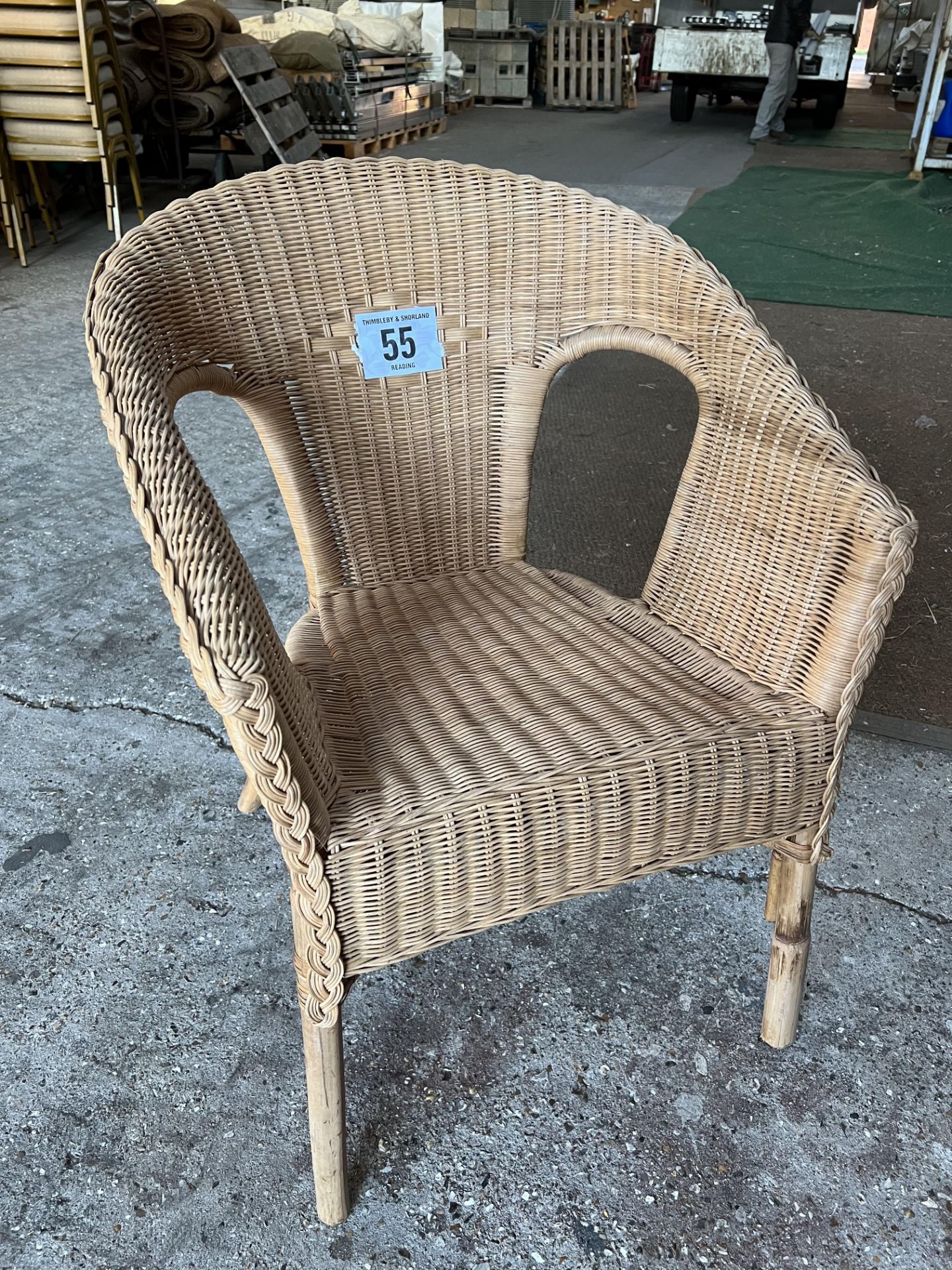 18 wicker garden armchairs. This lot is subject to VAT