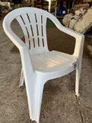 50 white resin garden armchairs. This lot is subject to VAT