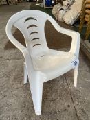 50 white resin garden armchairs. This lot is subject to VAT