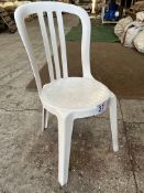 50 white resin bistro chairs. This lot is subject to VAT