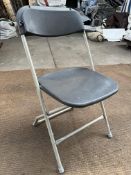 100 Samsonite folding chairs, charcoal. This lot is subject to VAT.