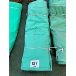 12ft x 12ft green cotton tarpaulin, hemmed, eyeletted and with ropes. This lot is subject to VAT