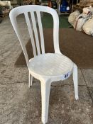 50 white resin bistro chairs. This lot is subject to VAT