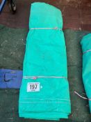 15ft x 9ft green cotton tarpaulin, hemmed, eyeletted and with ropes. This lot is subject to VAT