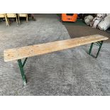 10 no 6ft long wooden benches with metal folding legs. This lot is subject to VAT