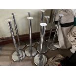 9 chrome stanchions, height 95cms. This lot is subject to VAT