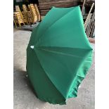 4 no 1.5m diameter green garden umbrellas. This lot is subject to VAT