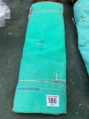 15ft x 12ft green cotton tarpaulin, hemmed, eyeletted and with ropes. This lot is subject to VAT