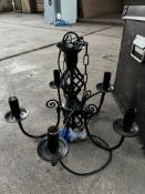 5 light black wrought iron chandelier; with ten spare new bulbs. This lot is subject to VAT