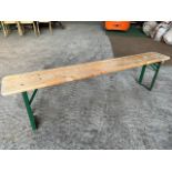 10 no 6ft long wooden benches with metal folding legs. This lot is subject to VAT