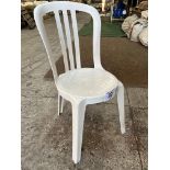 50 white resin bistro chairs. This lot is subject to VAT